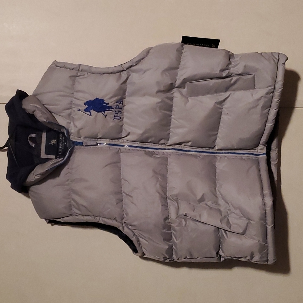U.S. Polo Assn. Size large puffer vest with hoodie.